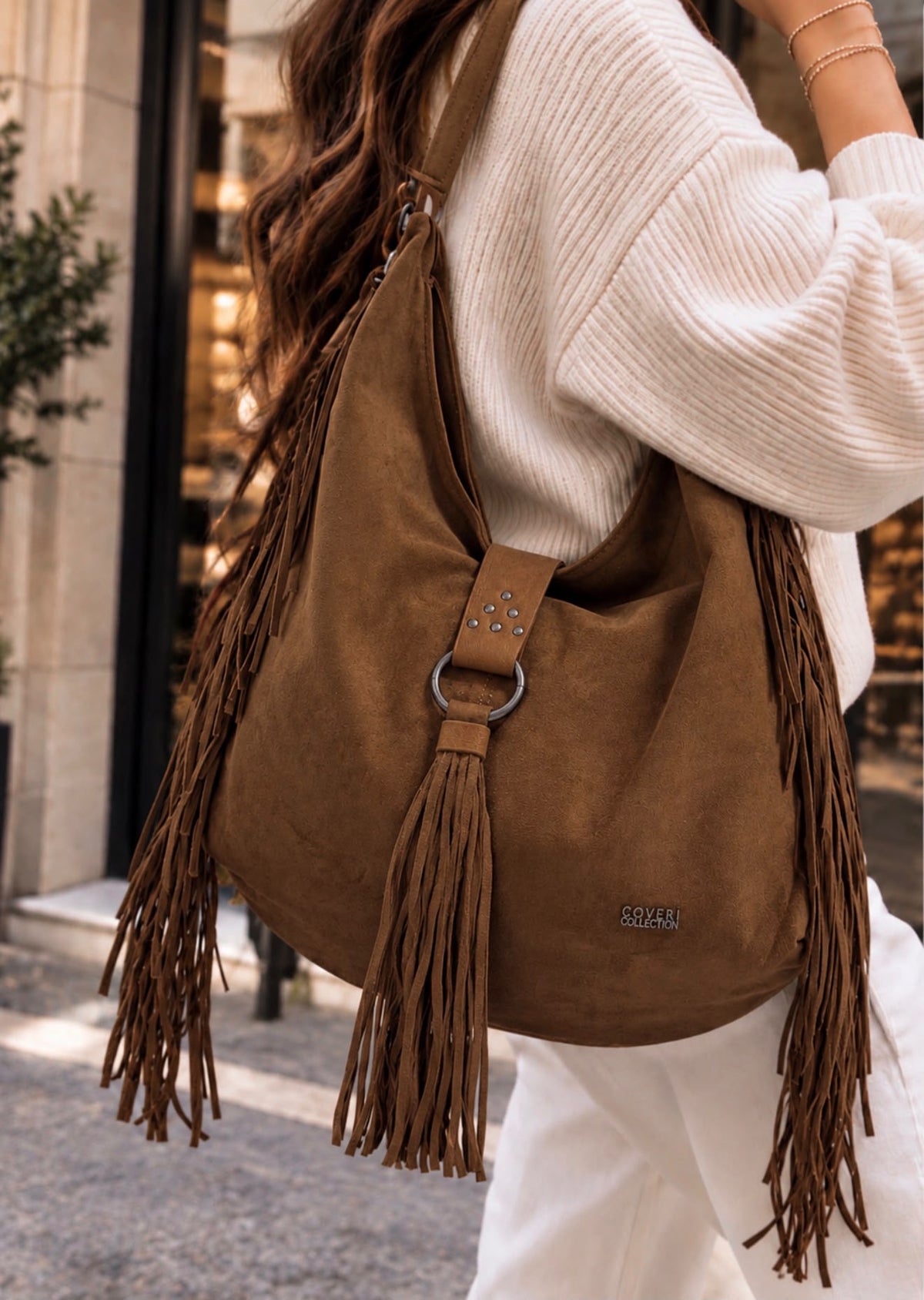 Ines Khaki - Borsa