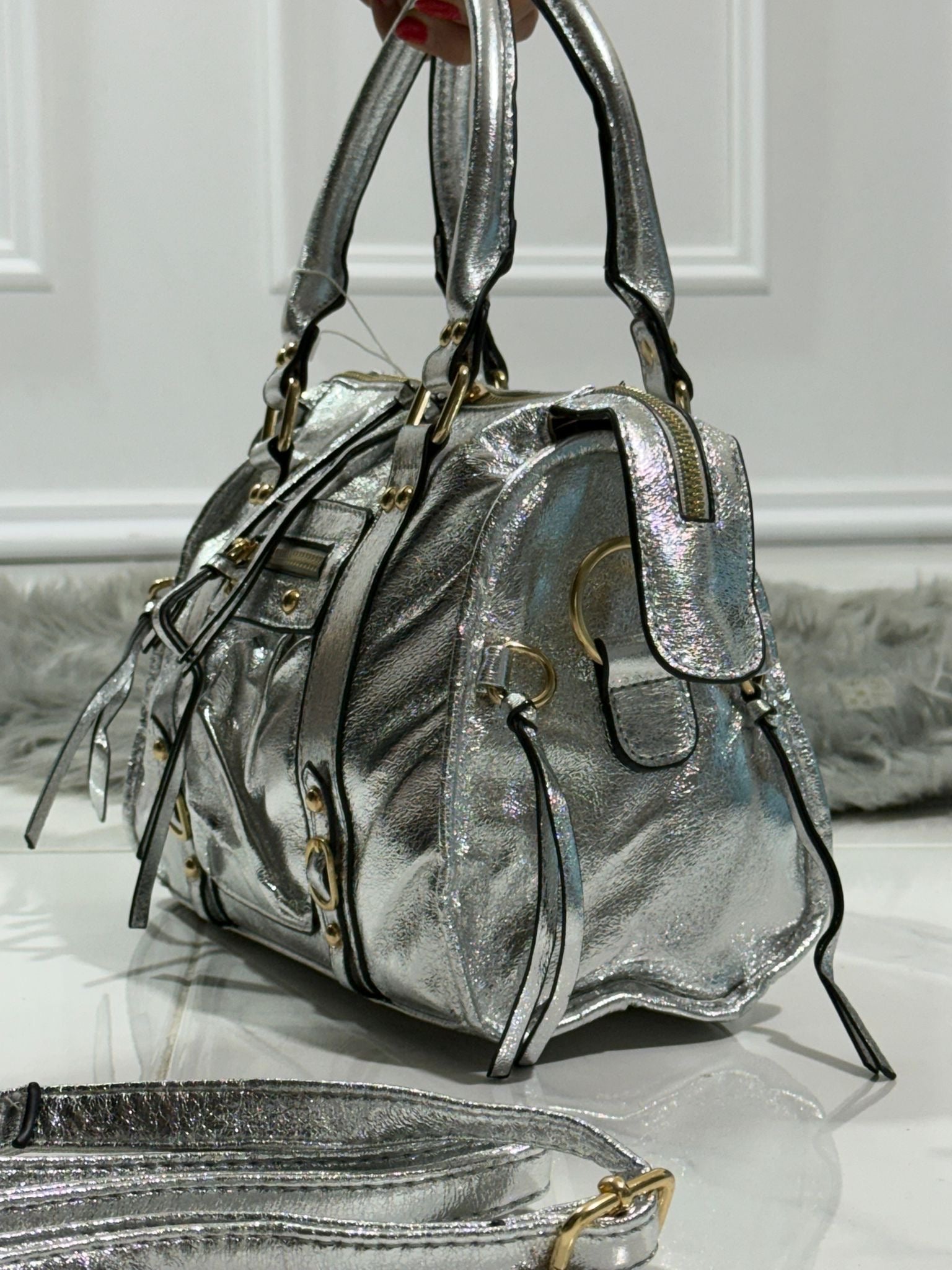 Erica Silver  - Borsa